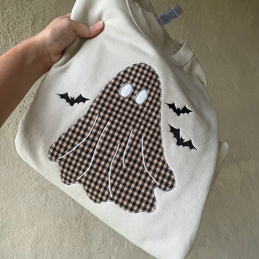 Neutral Halloween sweatshirt with plaid ghost appliqué and bats