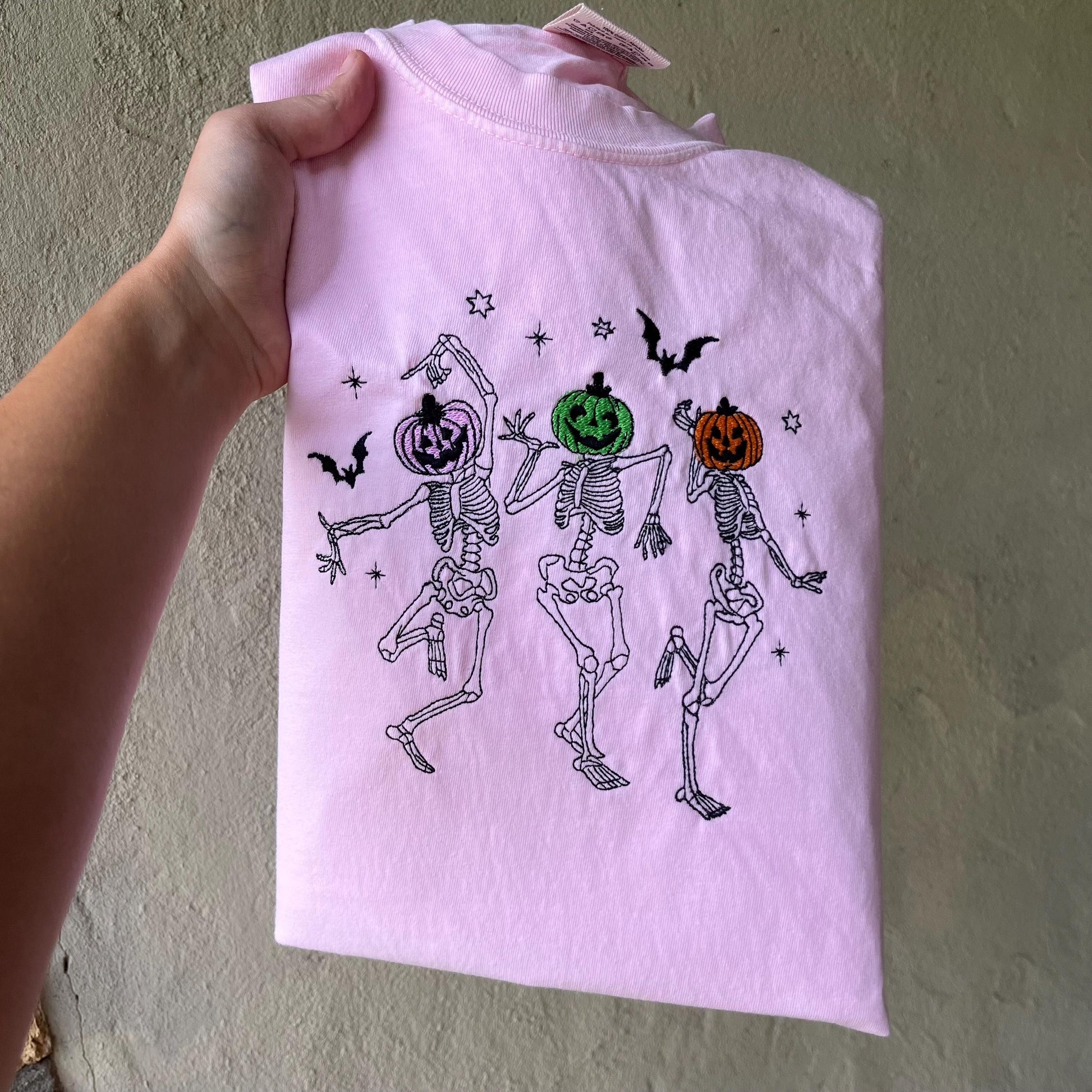 Pink Embroidered Halloween Shirt | Dancing Skeletons with Pumpkin Heads | Comfort Colors Fall Tee