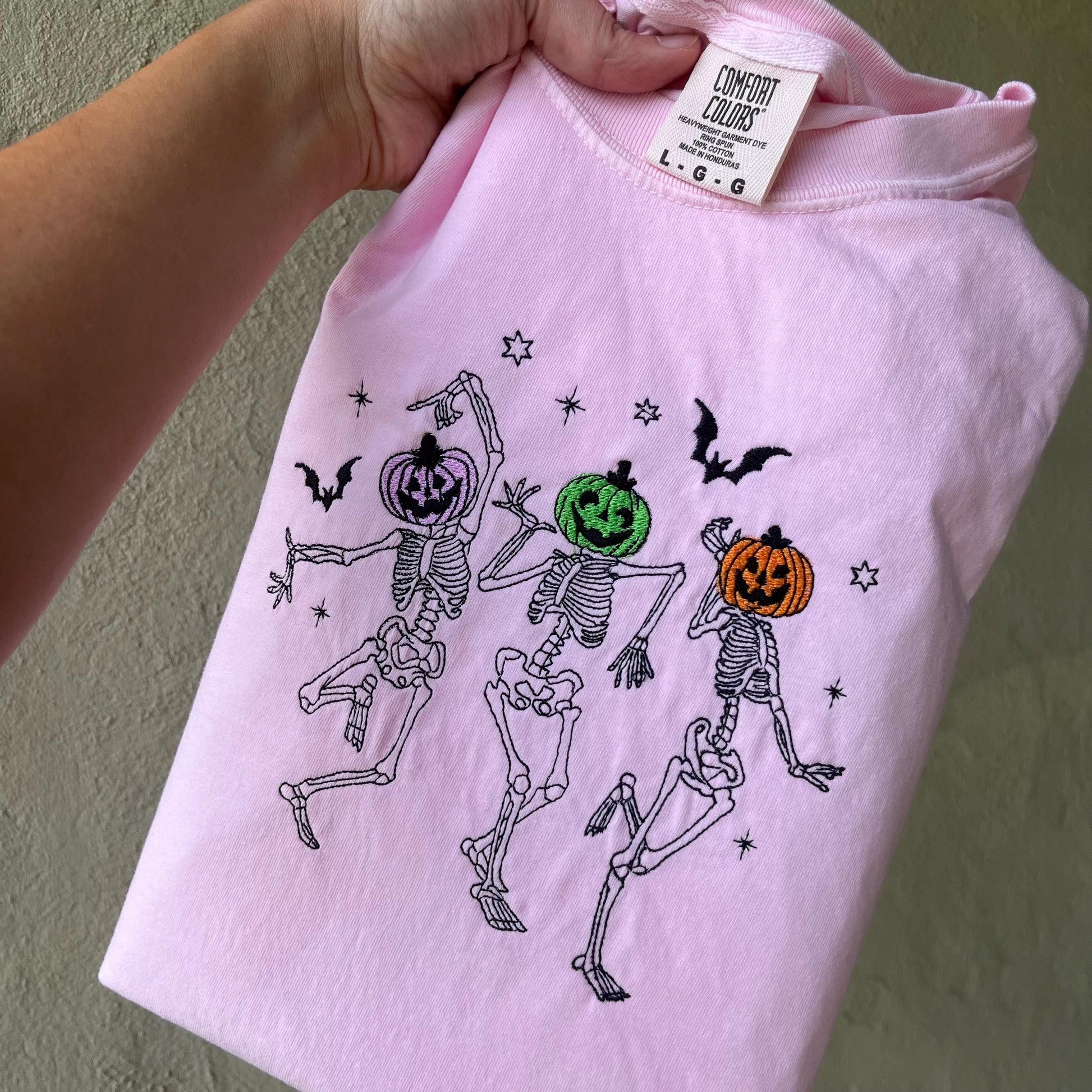 Pink Embroidered Halloween Shirt | Dancing Skeletons with Pumpkin Heads | Comfort Colors Fall Tee